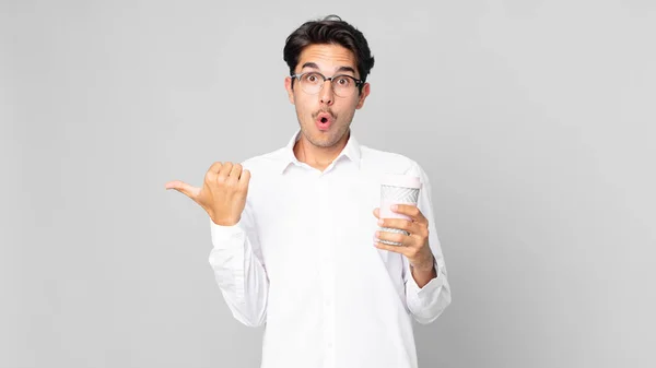 Young Hispanic Man Looking Astonished Disbelief Holding Take Away Coffee — Stock Photo, Image