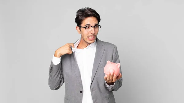 Young Hispanic Man Feeling Stressed Anxious Tired Frustrated Holding Piggy — Stock Photo, Image