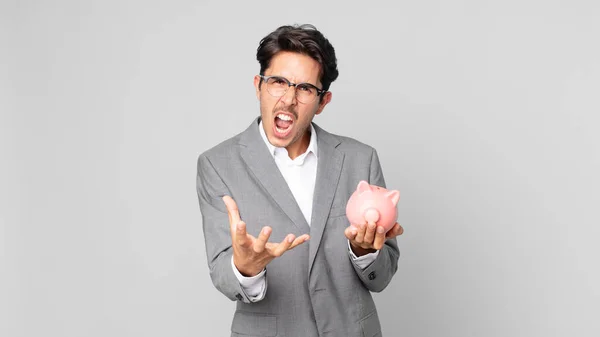 Young Hispanic Man Looking Angry Annoyed Frustrated Holding Piggy Bank — Stock Photo, Image