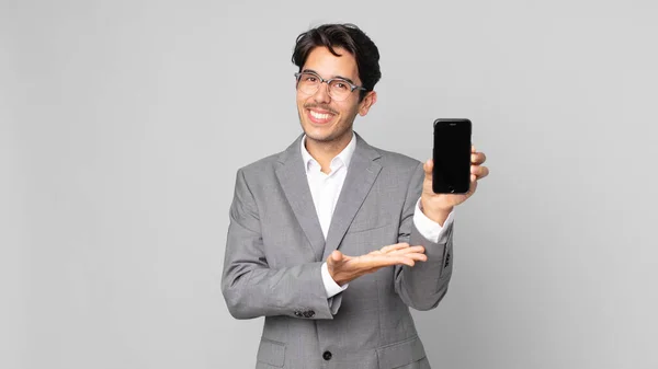 Young Hispanic Man Smiling Cheerfully Feeling Happy Showing Concept Holding — Stock Photo, Image