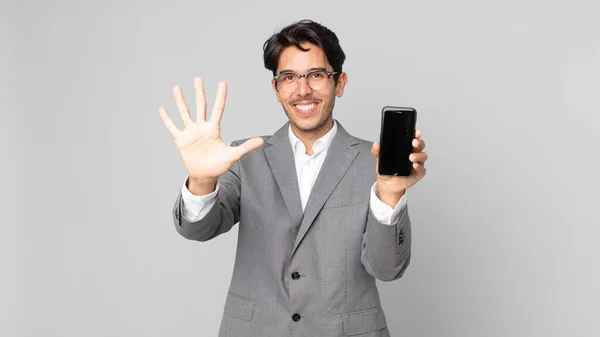 Young Hispanic Man Smiling Looking Friendly Showing Number Five Holding — Stock Photo, Image