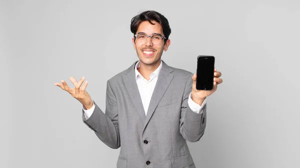 Young Hispanic Man Feeling Happy Surprised Realizing Solution Idea Holding — Stock Photo, Image