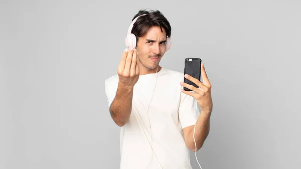 Genç Spanyol Adam Kapiş Para Hareketi Yapıyor Kulaklık Akıllı Telefonla — Stok fotoğraf