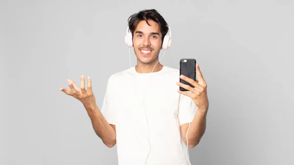 Young Hispanic Man Feeling Happy Surprised Realizing Solution Idea Headphones — Stock Photo, Image