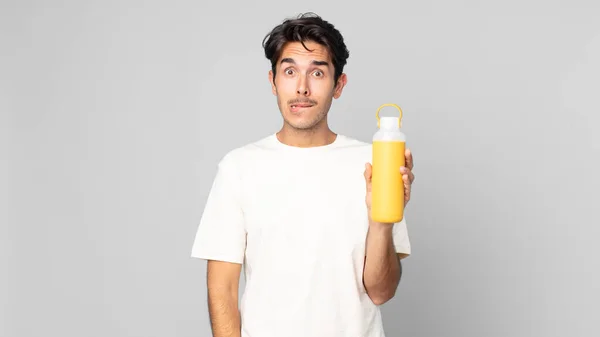 Young Hispanic Man Looking Puzzled Confused Coffee Thermos — Stock Photo, Image