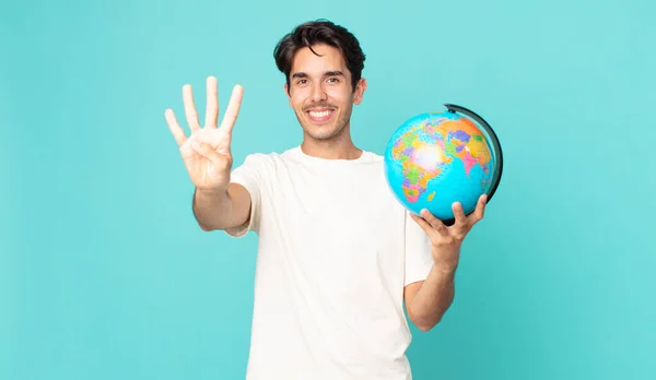 Joven Hispano Sonriendo Luciendo Amigable Mostrando Número Cuatro Sosteniendo Mapa —  Fotos de Stock