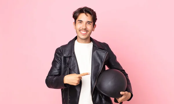 Young Hispanic Man Smiling Cheerfully Feeling Happy Pointing Side Motorbike — Stock Photo, Image