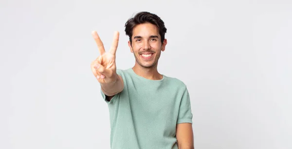 Hispanic Handsome Man Smiling Looking Happy Carefree Positive Gesturing Victory — Stock Photo, Image