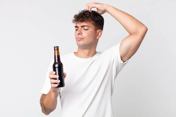 Young Handsome Man Feeling Puzzled Confused Scratching Head Holding Beer — Stock Photo, Image