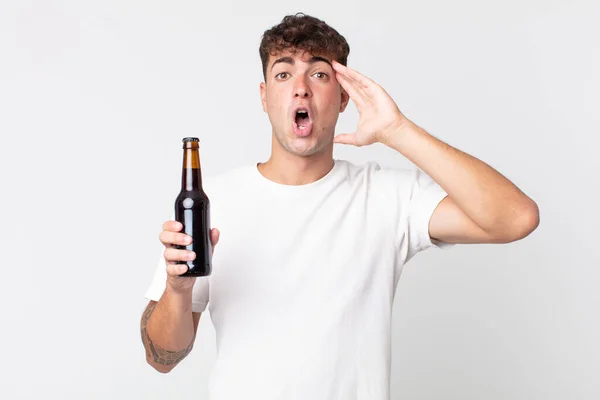 Young Handsome Man Looking Happy Astonished Surprised Holding Beer Bottle — Stock Photo, Image