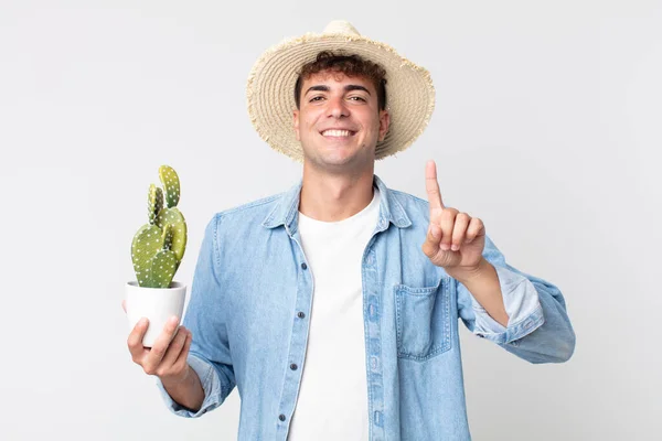 Young Handsome Man Smiling Proudly Confidently Making Number One Farmer — Stock Photo, Image