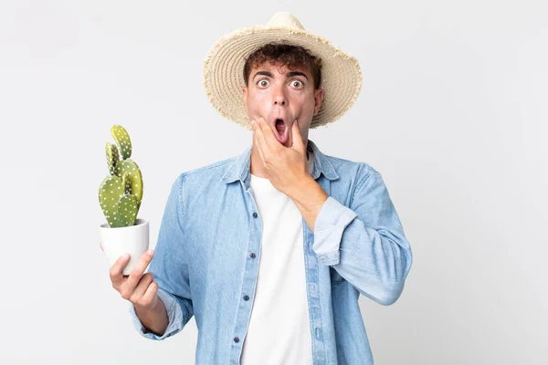 Young Handsome Man Mouth Eyes Wide Open Hand Chin Farmer — Stock Photo, Image