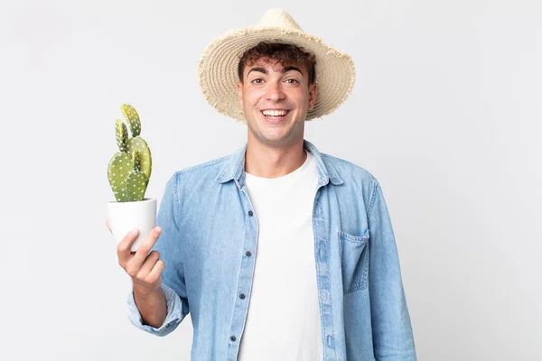 Young Handsome Man Looking Happy Pleasantly Surprised Farmer Holding Decorative — Stock Photo, Image
