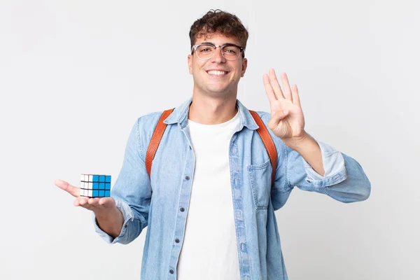 Jovem Bonito Homem Sorrindo Olhando Amigável Mostrando Número Quatro Conceito — Fotografia de Stock