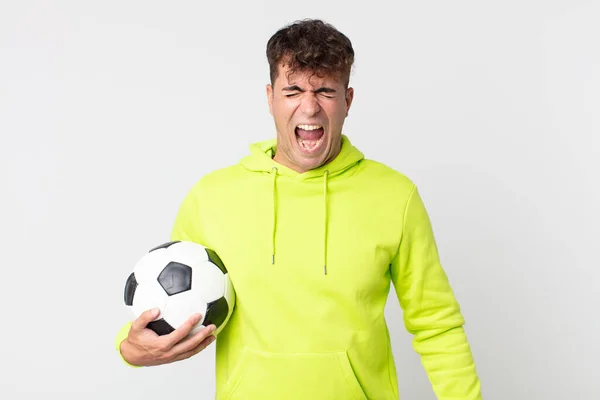 Young Handsome Man Shouting Aggressively Looking Very Angry Holding Soccer — Stock Photo, Image