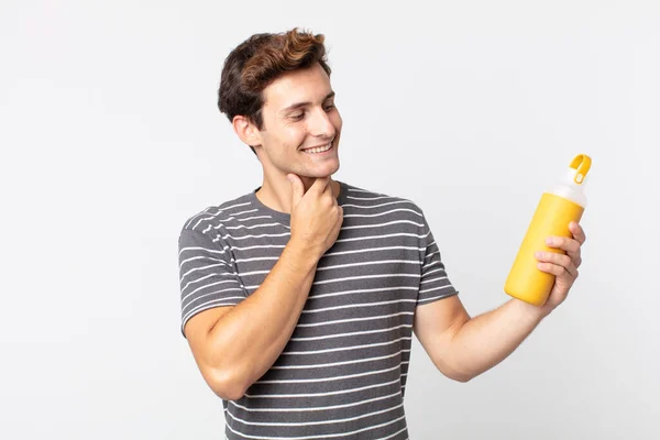 Young Handsome Man Smiling Happily Daydreaming Doubting Holding Coffee Thermos — Stock Photo, Image