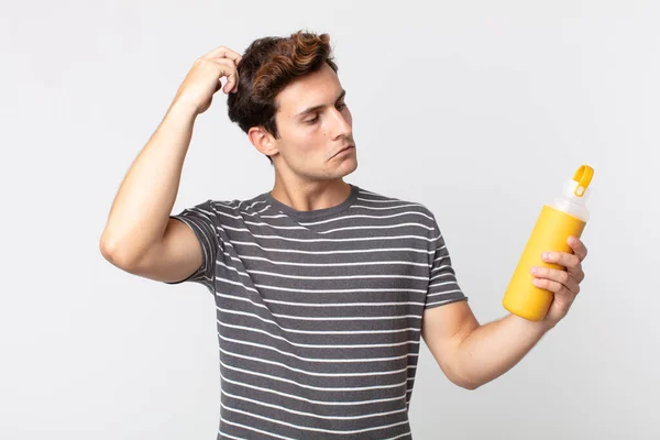 Young Handsome Man Feeling Puzzled Confused Scratching Head Holding Coffee — Stock Photo, Image