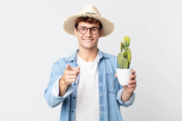 Young Handsome Man Pointing Camera Choosing You Farmer Holding Decorative — Stock Photo, Image