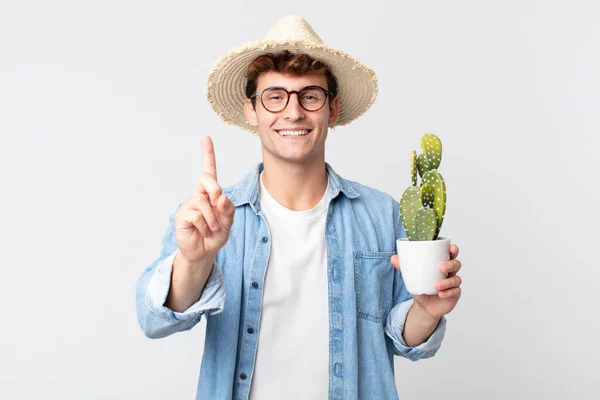 Young Handsome Man Smiling Proudly Confidently Making Number One Farmer — Stock Photo, Image