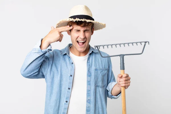 Joven Hombre Guapo Buscando Infeliz Estresado Gesto Suicida Haciendo Señal —  Fotos de Stock