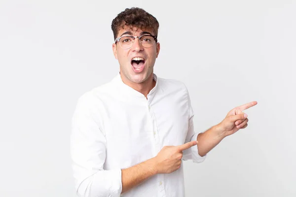 Young Handsome Man Feeling Shocked Surprised Pointing Copy Space Side — Stock Photo, Image