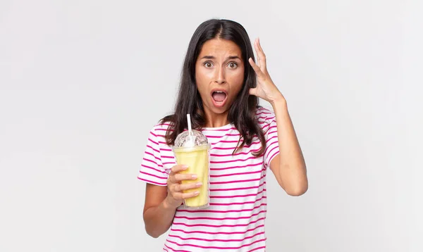 Young Hispanic Woman Screaming Hands Air Holding Vanila Smoothy Milkshake — Stock Photo, Image