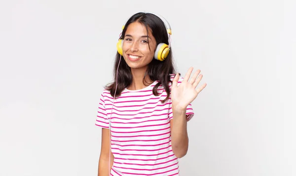 Young Hispanic Woman Smiling Happily Waving Hand Welcoming Greeting You — Stock Photo, Image