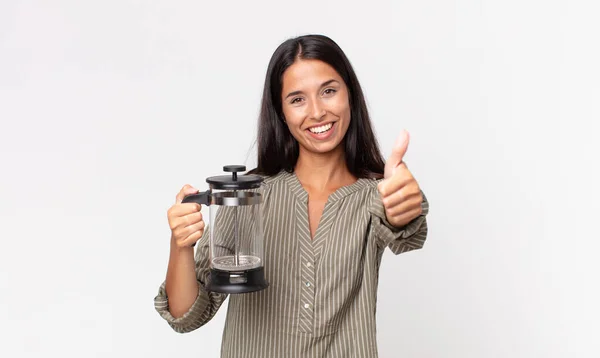 Young Hispanic Woman Feeling Proud Smiling Positively Thumbs Holding Manual — Stock Photo, Image