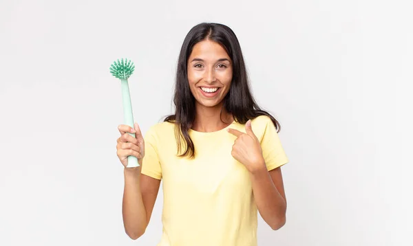 Young Hispanic Woman Feeling Happy Pointing Self Excited Holding Dish — Stock Photo, Image
