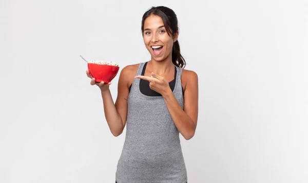 Young Hispanic Woman Looking Excited Surprised Pointing Side Fitness Diet — Stock Photo, Image