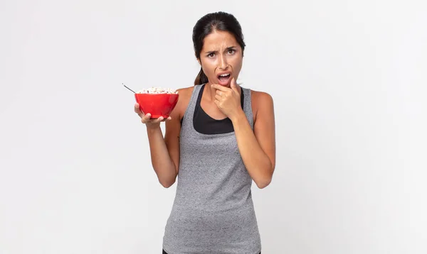 Young Hispanic Woman Mouth Eyes Wide Open Hand Chin Fitness — Stock Photo, Image