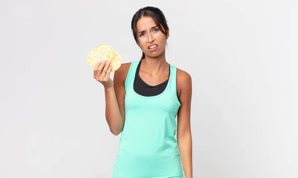 Young Hispanic Woman Feeling Puzzled Confused Fitness Diet Concept — Stock Photo, Image