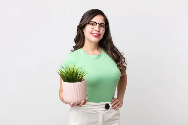 Pretty Woman Smiling Happily Hand Hip Confident Holding Decorative Plant — Stock Photo, Image