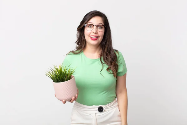 Pretty Woman Looking Happy Pleasantly Surprised Holding Decorative Plant — Stock Photo, Image