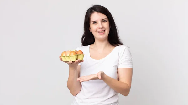 Pretty Woman Smiling Cheerfully Feeling Happy Showing Concept Holding Eggs — Stock Photo, Image
