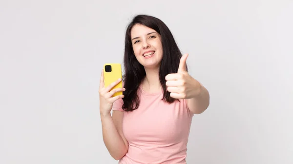 Pretty Woman Feeling Proud Smiling Positively Thumbs Using Smart Phone — Stock Photo, Image