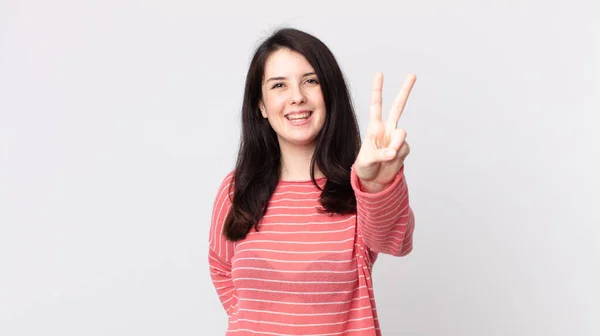 Pretty Woman Smiling Looking Happy Carefree Positive Gesturing Victory Peace — Stock Photo, Image