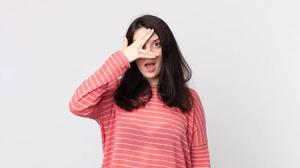 Pretty Woman Looking Shocked Scared Terrified Covering Face Hand Peeking — Stock Photo, Image