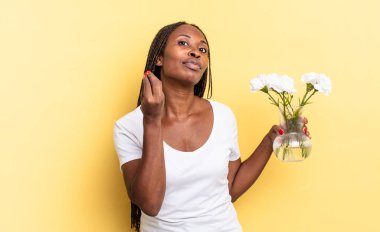 Kapiş ya da para hareketi yapmak, borçlarını ödemeni söylemek! Dekoratif çiçek konsepti