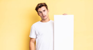 feeling puzzled and confused, with a dumb, stunned expression looking at something unexpected. empty canvas concept