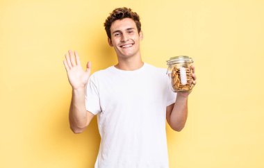 Mutlu ve neşeyle gülümseyen, el sallayan, seni selamlayan, ya da hoşça kal diyen. Ev yapımı kurabiye konsepti