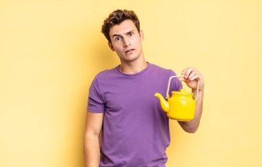 feeling puzzled and confused, with a dumb, stunned expression looking at something unexpected. teapot concept