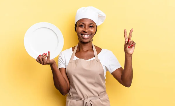 Black Afro Chef Woman Smiling Looking Friendly Showing Number Two — Stock Photo, Image