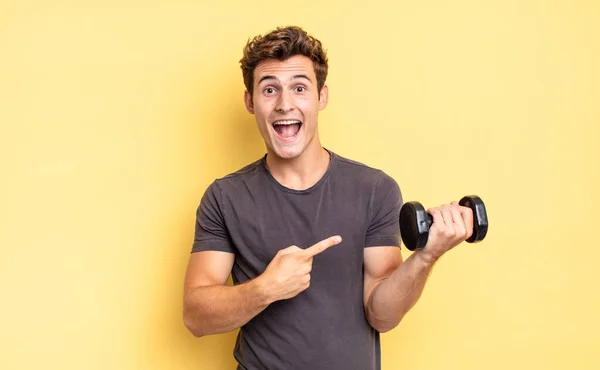 Looking Excited Surprised Pointing Side Upwards Copy Space Dumbbell Concept — Stock Photo, Image