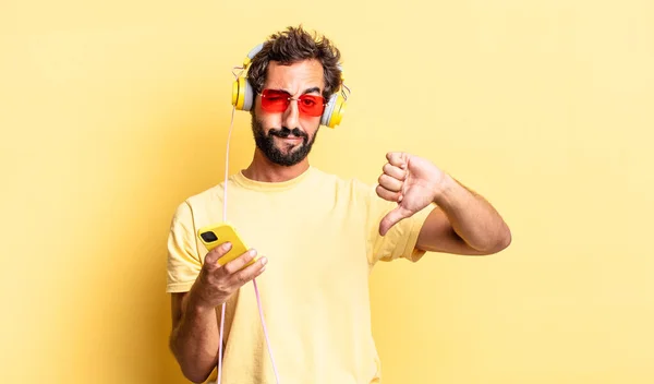 Expressive Crazy Man Feeling Cross Showing Thumbs Headphones — Stock Photo, Image