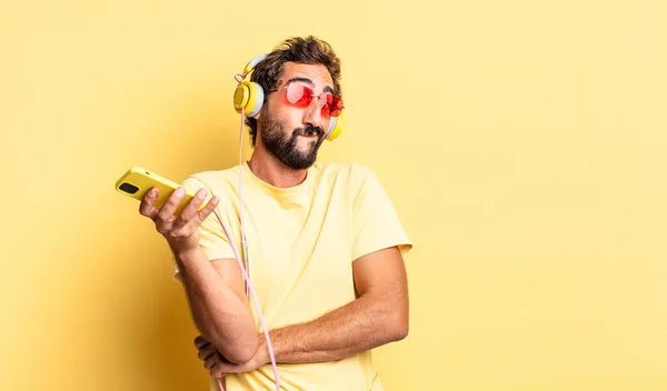 Expressive Crazy Man Shrugging Feeling Confused Uncertain Headphones — Stock Photo, Image