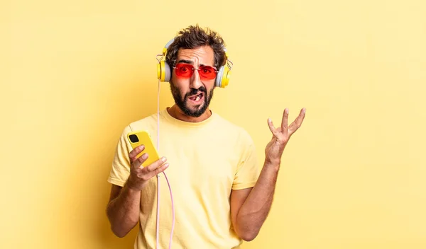 Expressive Crazy Man Screaming Hands Air Headphones — Stock Photo, Image