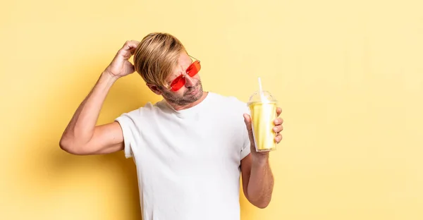 Blond Adult Man Feeling Puzzled Confused Scratching Head Milkshake — Stock Photo, Image