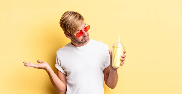 Blond Adult Man Feeling Puzzled Confused Doubting Milkshake — Stock Photo, Image