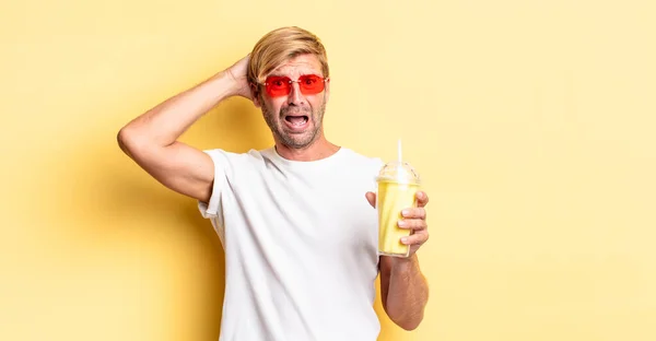 Blond Adult Man Feeling Stressed Anxious Scared Hands Head Milkshake — Stock Photo, Image